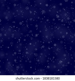 Patrón ininterrumpido de Navidad de copos de nieve de diferentes formas, tamaños y transparencia, sobre fondo azul oscuro