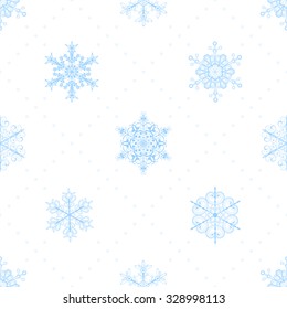 Christmas seamless pattern of snowflakes and dots, light blue on white