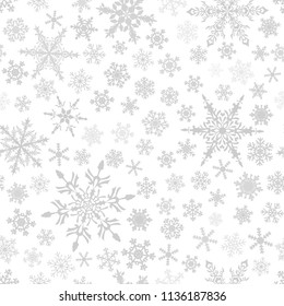 Christmas seamless pattern of snowflakes, gray on white background.