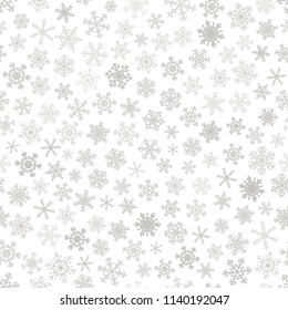 Christmas seamless pattern of snowflakes, gray on white background.
