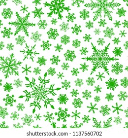 Christmas seamless pattern of snowflakes, green on white background.