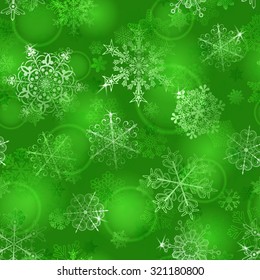 Christmas seamless pattern of snowflakes in green colors