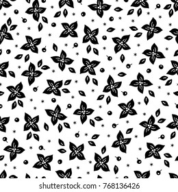 Christmas seamless pattern with snowflakes, leaves, berries and flowers in black and white. Perfect for wallpaper and greeting cards