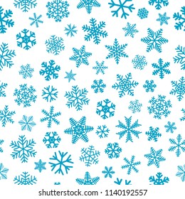 Christmas seamless pattern of snowflakes, light blue on white background