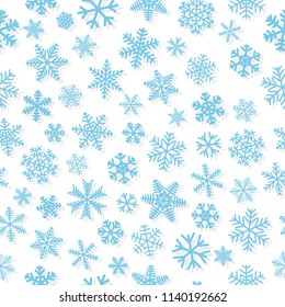 Christmas seamless pattern of snowflakes, light blue on white background