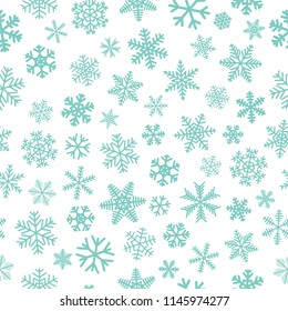 Christmas seamless pattern of snowflakes, light blue on white background