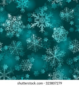 Christmas seamless pattern of snowflakes in light blue colors