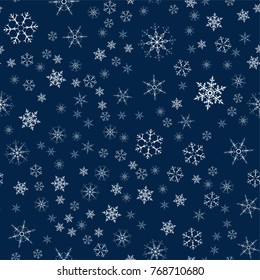 Christmas seamless pattern from snowflakes. New year festive texture for design postcards, invitations, greetings, and clothing. Vector illustration.