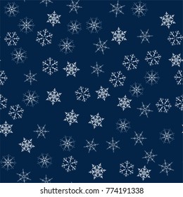 Christmas seamless pattern from snowflakes. New year festive texture for design postcards, invitations, greetings, and clothing. Vector illustration.