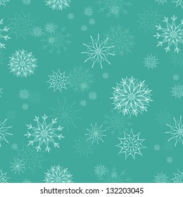 Christmas seamless pattern with snowflakes on blue background