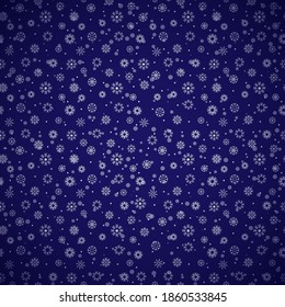 Christmas seamless pattern of snowflakes on a blue background