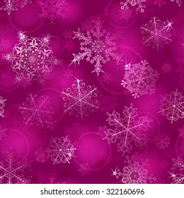 Christmas seamless pattern of snowflakes in pink colors