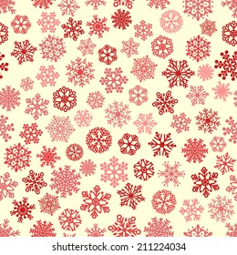 Christmas seamless pattern of snowflakes, red and brown on white