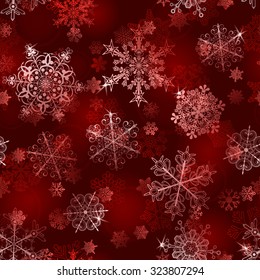 Christmas seamless pattern of snowflakes in red colors
