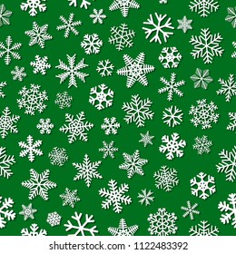 Christmas seamless pattern of snowflakes with shadows, white on green background
