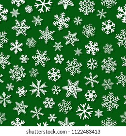 Christmas seamless pattern of snowflakes with shadows, white on green background