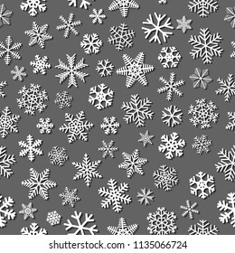 Christmas seamless pattern of snowflakes with shadows, white on gray background