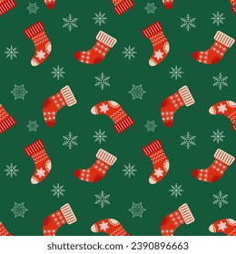 Navidad sin fisuras con copos de nieve y medias de Navidad. Fondo verde festivo, vector