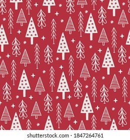 Christmas seamless pattern with snowflakes, stars and fir trees on red background. Scandinavian style. Perfect for holiday invitations, winter greeting cards, wallpaper and gift paper 