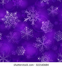 Christmas seamless pattern of snowflakes in violet colors