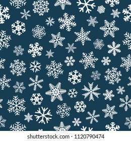 Christmas seamless pattern of snowflakes, white on blue background
