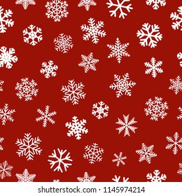 Christmas seamless pattern of snowflakes, white on red background