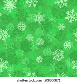 Christmas seamless pattern of snowflakes, white on green