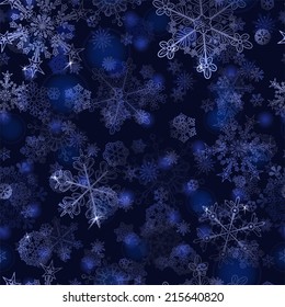 Christmas seamless pattern of snowflakes, white on blue