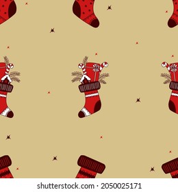 Christmas seamless pattern. Christmas sock with gifts and chocolates. Vector illustration. Hand drawn sketch for decor, design, print, packaging, wallpaper and textile