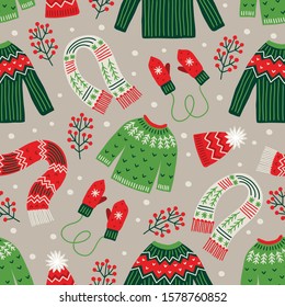 Christmas seamless pattern with sweater, berries, scarfs, woolen hats, mittens, snowflakes on grey background. Perfect for greeting cards, wallpaper, gift paper, winter decorations