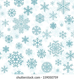 Christmas seamless pattern from turquoise snowflakes on white background