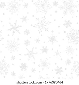 Christmas seamless pattern with various complex big and small snowflakes, gray on white background