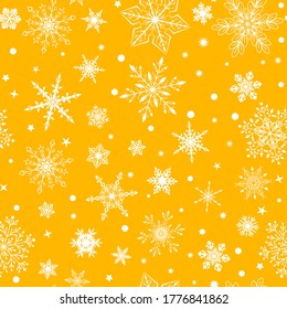 Christmas seamless pattern with various complex big and small snowflakes, white on yellow background