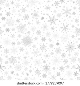 Christmas seamless pattern with various complex big and small snowflakes, gray on white background