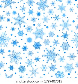 Christmas seamless pattern of various complex big and small snowflakes, light blue on white background