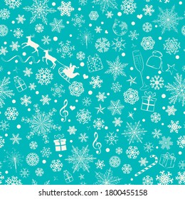 Christmas seamless pattern of various snowflakes and holiday symbols, white on light blue background