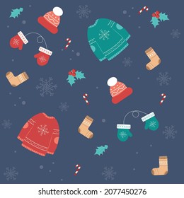 Patrón de Navidad sin fisuras con ropa de abrigo y caramelos. Fondo de Navidad