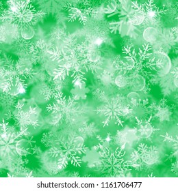 Christmas seamless pattern with white blurred snowflakes, glare and sparkles on green background
