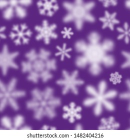 Christmas seamless pattern of white defocused snowflakes on purple background