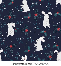 Christmas seamless pattern with white rabbits and holly on a dark background for wrapping paper, postcards, holiday background. Holly with mistletoe on a dark background.