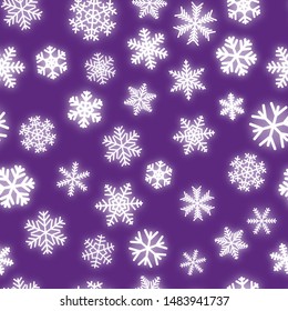 Christmas seamless pattern of white snowflakes of different shapes on purple background