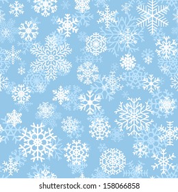 Christmas seamless pattern from white snowflakes on cyan background