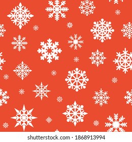 Christmas seamless pattern. White snowflakes on a red background. Great for fabric, textile Vector Illustration. christmas card with snowflake border vector illustration. Scandinavian Christmas.
