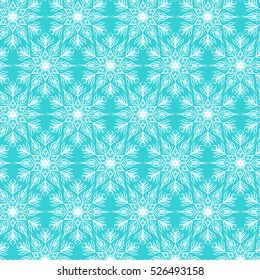 Christmas seamless pattern with white snowflakes on green background