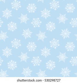 Christmas seamless pattern with white snowflakes on turquoise background