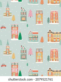 Christmas seamless pattern with winter town and houses 