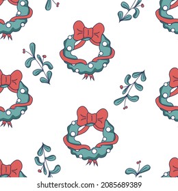 Christmas seamless pattern with Christmas wreath and a twig with berries. Festive hand-drawn background in doodle style. New Year collection. For cards, invitations, fabrics, stationery.
