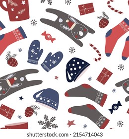 Christmas seamless patterns with hares, rabbits in Santa hats. Snowflakes, stars, winter print for the new year, socks, mittens, cups with a warm drink. Vector graphics.