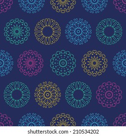 Christmas seamless vector pattern from colorful snowflakes.