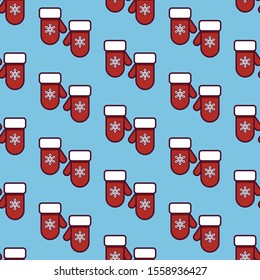 Christmas seamless vector pattern with mittens on blue background. Mittens with snowflake print